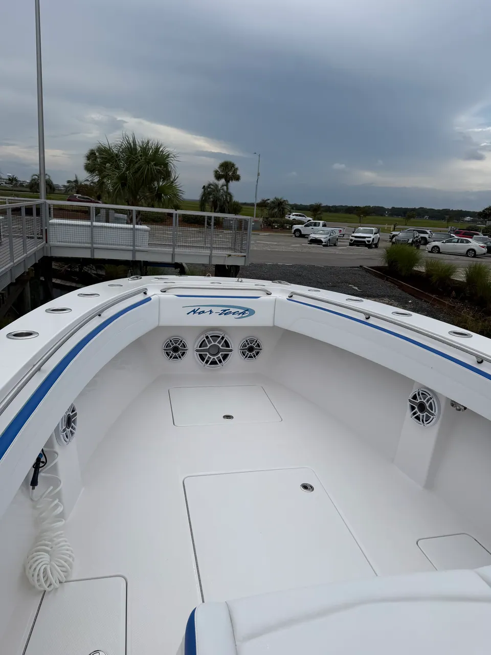 Clean white bow deck and seating on a center console